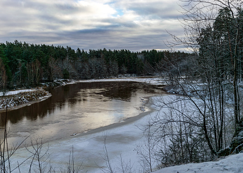 view of the river on a winter day, Gauja river near Valmiera, Latvia
