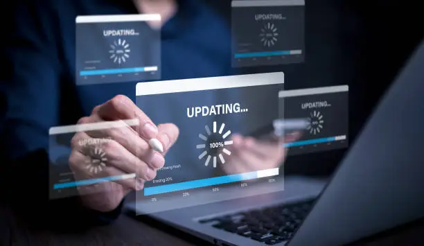 Photo of Hand touch bar of Update Software Computer Program Upgrade Business Technology Internet, Update on virtual screen. Internet and technology concept, loading bar with installing the update.