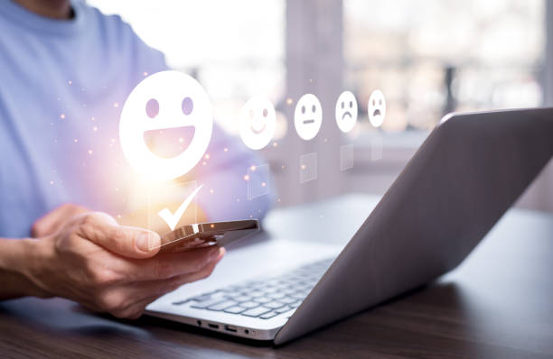 istock Man touch smartphone with Customer review satisfaction feedback survey concept, User give rating to service experience on online application, service leading to reputation ranking of business. 1997813183