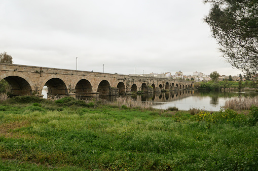 El Puente Romano, the longest ancient Roman bridge over the River Guadiana in Mérida, Extremadura is on the Via de la Plata pilgrimage route from Seville to Santiago de Compostela