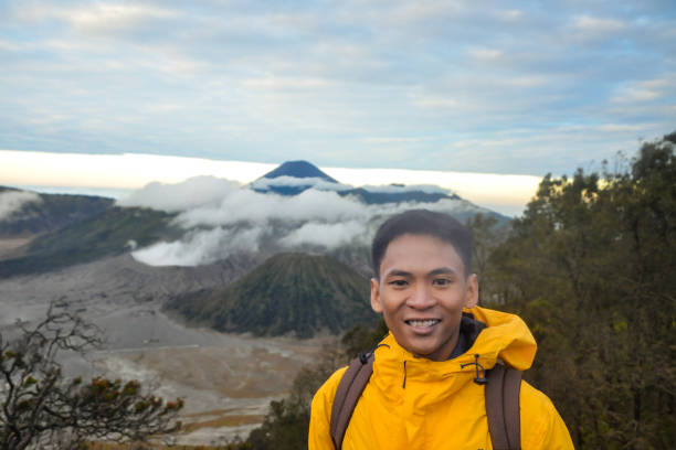 istock Solo Traveler Man Discovering Indonesia Nature 1997837079