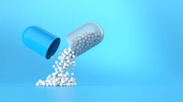 istock Antibiotic or vitamin pill on a blue background. 1997838139