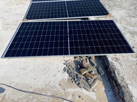 Solar Panels on a roof of a house to install solar power station for off-grid clean energy in Pakistan