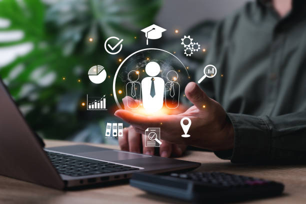 istock HR Human resources, Human management concept, Businessman use technology selected qualifications of human, Recruitment, leadership, and team building. Business and technology digital marketing online. 1997885156