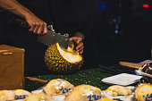 cutting durian food on the street