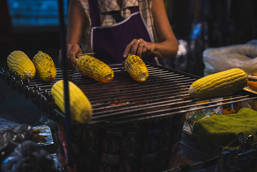 Selling roasted corn on the street