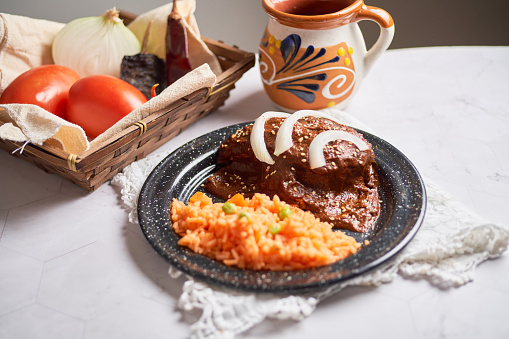 Chicken mole poblano, with chocolate and chilli. Tradition from mexico.