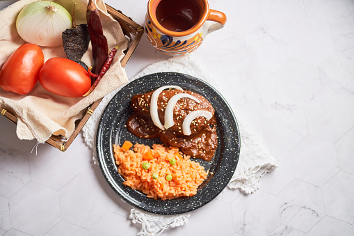 Chicken mole poblano, with chocolate and chilli. Tradition from mexico.