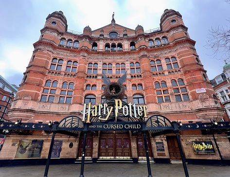 London, UK - January 11, 2024: Palace Theatre in London with a sign promoting the play Harry Potter and the Cursed Child.