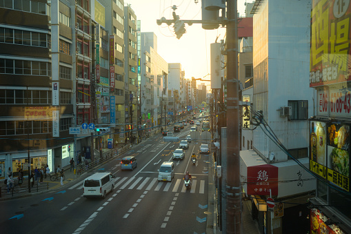 Aerial view Busy traffic and crowd of people enjoying shopping at central of kyoto Karasuma-dori Street