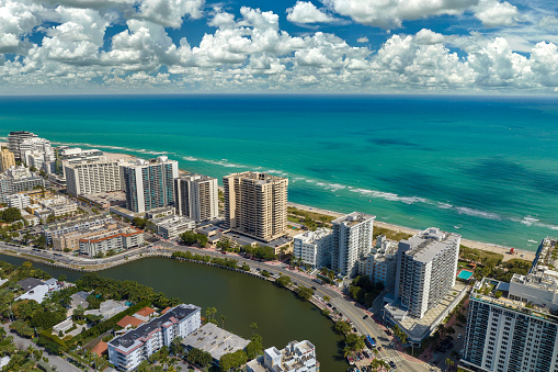 View from above of American southern seashore of Miami Beach city. South Beach high luxurious hotels and apartment buildings. Tourist infrastructure in southern Florida, USA.