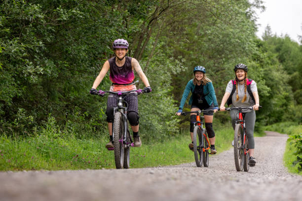 istock Enjoying Nature with Friends on Mountain Bikes 1998042795
