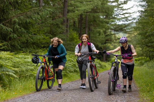 istock Talking and Discussing up a Bike Trail 1998045437