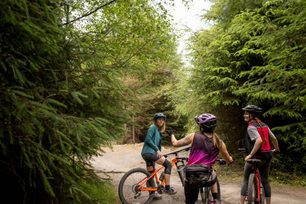 istock Woman Taking a Break on Their Mountain Bikes 1998047056