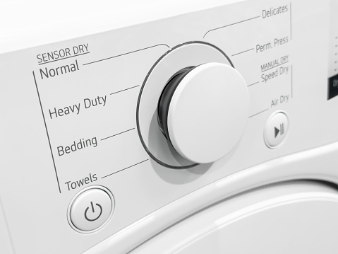 Close up photo of washing machine control panel