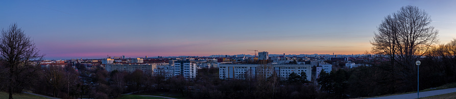 Panoramic of Munich city center from Olympia Park during the blue hour  in winter season.