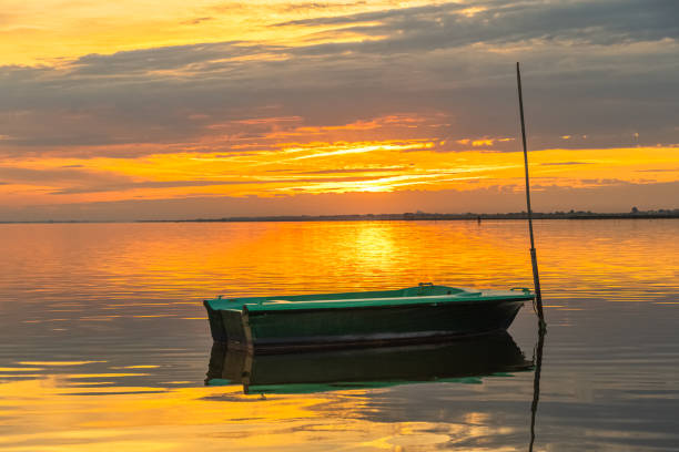 Sunset at the Etang de l'Or at the cabanes de Pérols, near La Camargue, South of France.