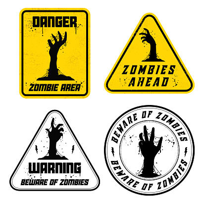 A set of Beware of Zombies Halloween theme signs and placards. Each design on a different layer.