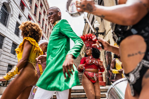 istock People having fun and dancing at a street carnival party 1998208358
