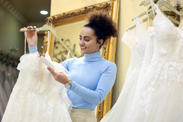 istock Future bride choosing her wedding dress 1998208359