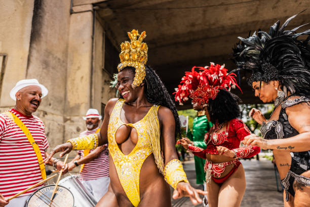 istock People having fun and dancing at a street carnival party 1998209439