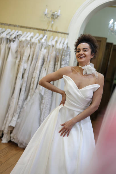 istock Bride trying on a wedding dress 1998210982