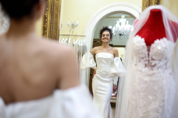 istock Trying on a wedding dress 1998212030