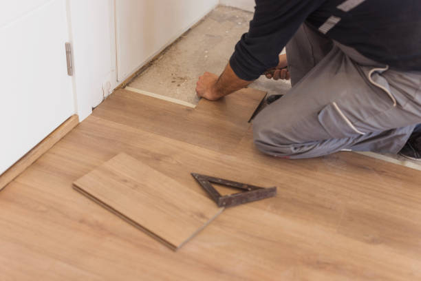 istock Handyman installing hardwood floor 1998218298