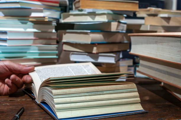 istock Big pile of messy books 1998248637