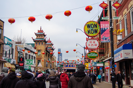 A crowd spreads across Wentworth Avenue in Chicago's Chinatown neighborhood shortly after the annual Lunar New Year parade in 2023.