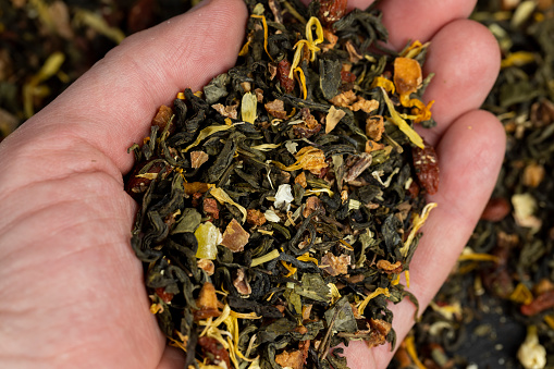 dry green tea with jasmine flowers, calendula, pineapple slices, high-quality green tea with additives for taste and smell