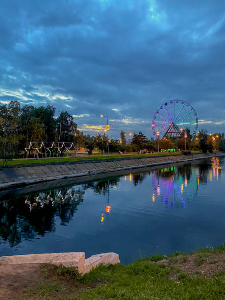 istock Amusement park with ferris wheel at night, Irkutsk, Russia 1998296615