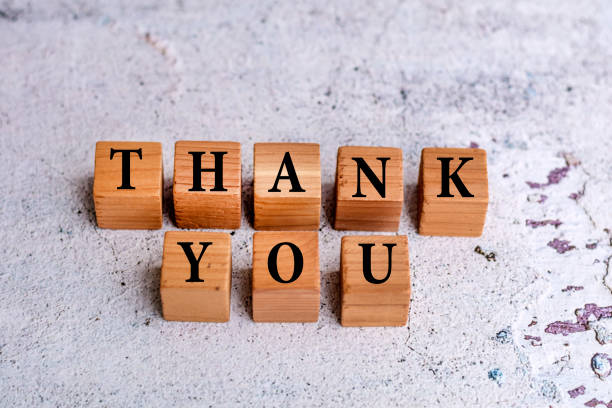 istock Thank you written on wooden cubes 1998309926
