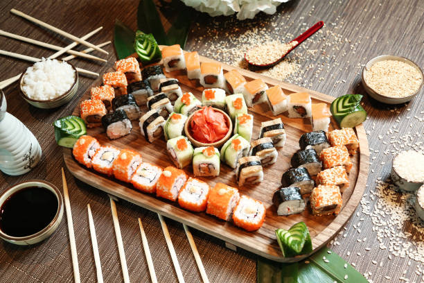 istock Wooden Tray With Sushi and Chopsticks 1998390452