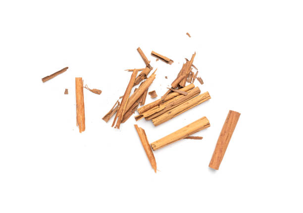 Close-up of cinnamon powder and cinnamon sticks