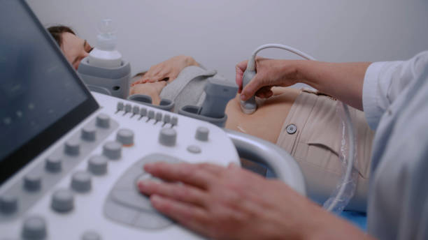 istock Medical specialist conducts ultrasound diagnostic using sonography machine 1998435274