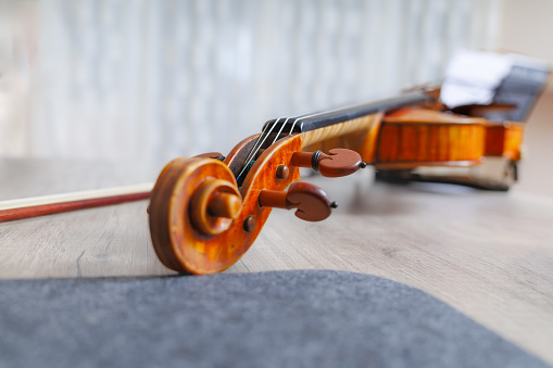 Classic violin on wooden table