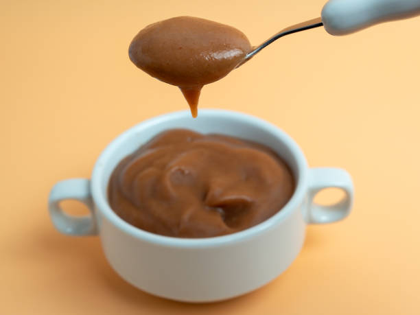 istock Baby food in puree form. 1998502704