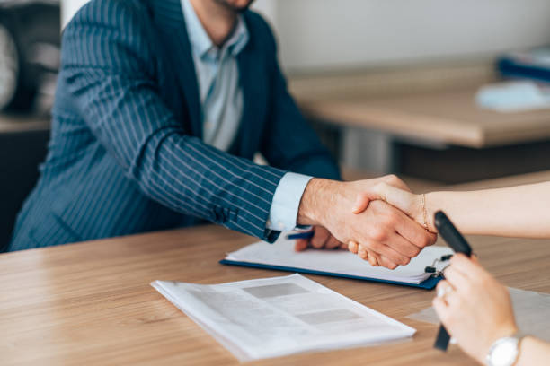 istock Businessman signs buying contract 1998587859