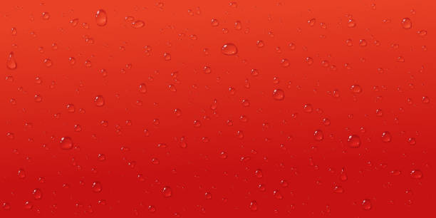 istock Red drops abstract background. Condensate on glass in close up. 1998592208
