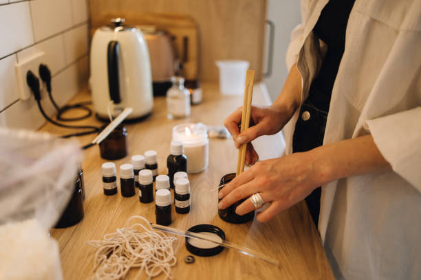 istock The unrecognizable woman doing a homemade candle at home 1998605000