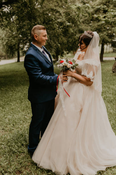 istock first meeting newlyweds groom wait sees bride hug 1998608198