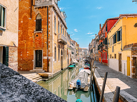 Scenic Canal with Vibrant Colored Buildings in Venice, Italy