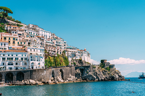 The Amalfi Coast is a picturesque stretch of coastline in southern Italy, known for its dramatic cliffs, vibrant seaside villages, and stunning views of the Tyrrhenian Sea.