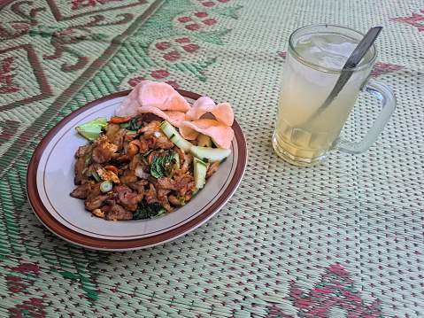 Delicious Fried Cap Cay Or Cap Cai Goreng With Chicken Meat, Egg, Crackers, Mix Vegetables And Lime Iced Drink. CapCai CapCay Goreng Dan Es Jeruk Nipis Food And Drink Menu.