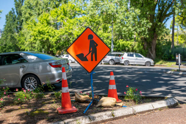 Roadworks sign in sidewalk