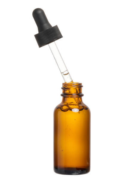 istock A glass brown bottle with a dropper on a white isolated background 1998794534