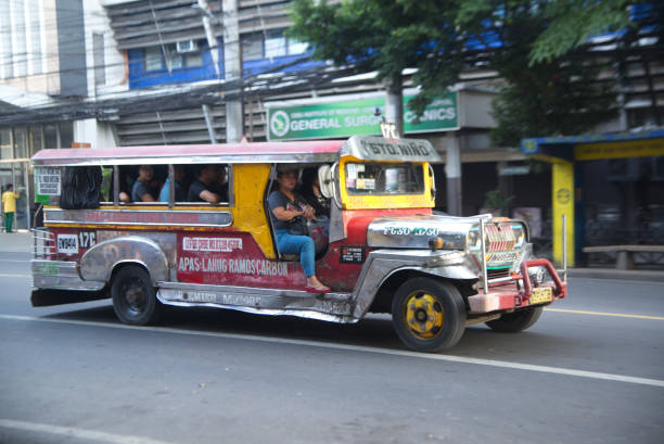 Cebu , Philippines - January 30 , 2020 : Jeepneys are public transportation vehicles in the Philippines. They are the same type of buses as taxis or songthaews. It is unique to the Philippines on January , 30 , 2020 at Cebu city in Philiipines.