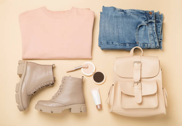 istock Flat lay with trendy spring outfit on color background, top view 1998943567