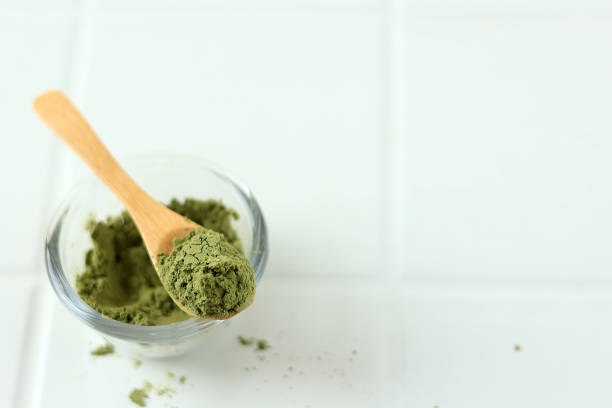 istock Matcha Green Tea Powder on Wooden Spoon 1999010740